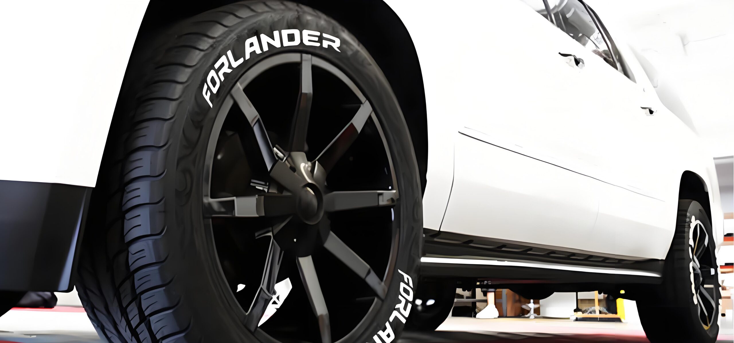 Forlander white letter tyre