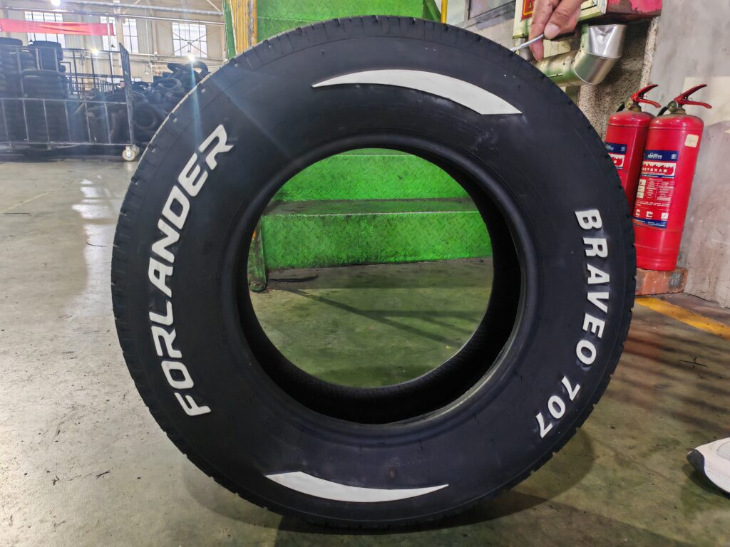 BRAVEO 707 raised white letter tire